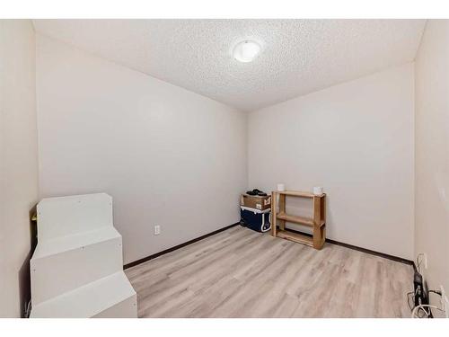 2304-10 Prestwick Bay Se, Calgary, AB - Indoor Photo Showing Other Room