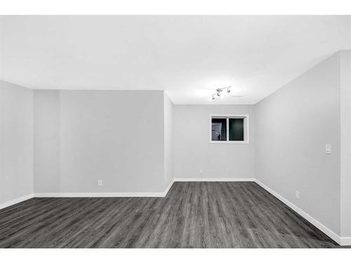 102-1728 34 Street Se, Calgary, AB - Indoor Photo Showing Other Room