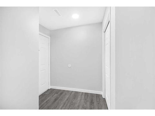 102-1728 34 Street Se, Calgary, AB - Indoor Photo Showing Other Room