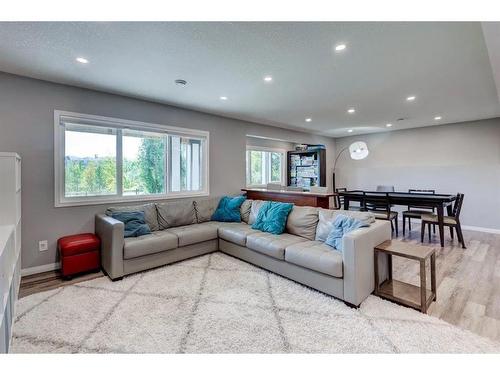 36 Auburn Springs Cove Se, Calgary, AB - Indoor Photo Showing Living Room