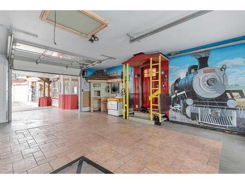 48010 244 Avenue West, Rural Foothills County, AB - Indoor Photo Showing Garage