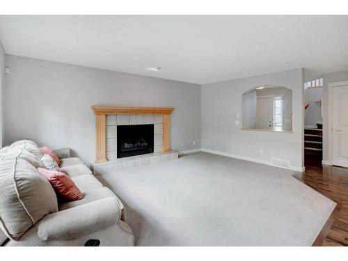 114 Kincora Park Nw, Calgary, AB - Indoor Photo Showing Living Room With Fireplace