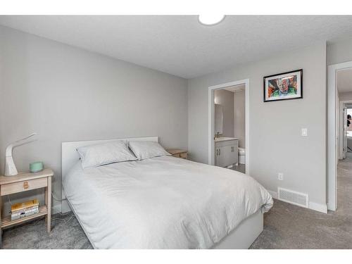 1865 Na'A Drive Sw, Calgary, AB - Indoor Photo Showing Bedroom