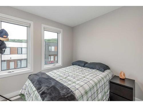 1865 Na'A Drive Sw, Calgary, AB - Indoor Photo Showing Bedroom