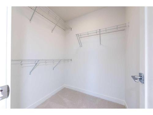 811 Carrington Boulevard Nw, Calgary, AB - Indoor With Storage