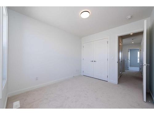 811 Carrington Boulevard Nw, Calgary, AB - Indoor Photo Showing Other Room