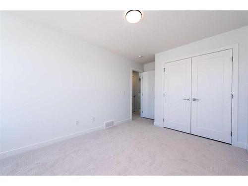 811 Carrington Boulevard Nw, Calgary, AB - Indoor Photo Showing Other Room