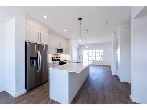 811 Carrington Boulevard Nw, Calgary, AB - Indoor Photo Showing Kitchen With Upgraded Kitchen