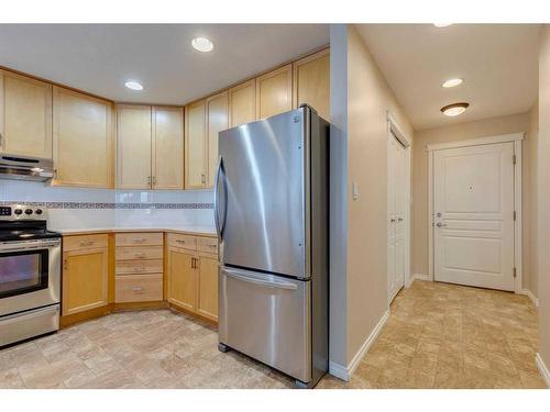 404-1718 14 Avenue Nw, Calgary, AB - Indoor Photo Showing Kitchen With Stainless Steel Kitchen