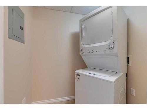 404-1718 14 Avenue Nw, Calgary, AB - Indoor Photo Showing Laundry Room