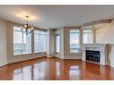 404-1718 14 Avenue Nw, Calgary, AB  - Indoor With Fireplace 