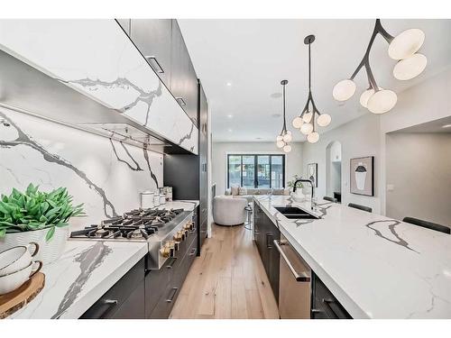 1931 43 Avenue Sw, Calgary, AB - Indoor Photo Showing Kitchen With Double Sink With Upgraded Kitchen