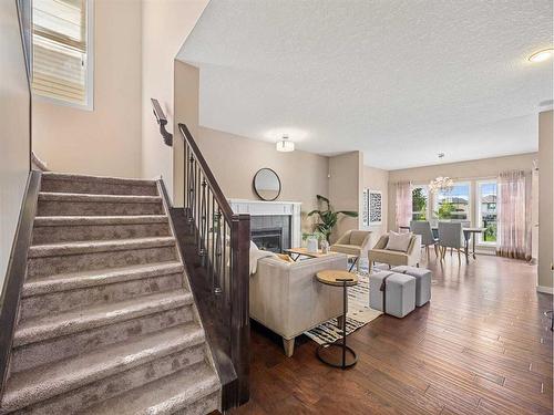 73 Kincora Glen Rise Nw, Calgary, AB - Indoor With Fireplace