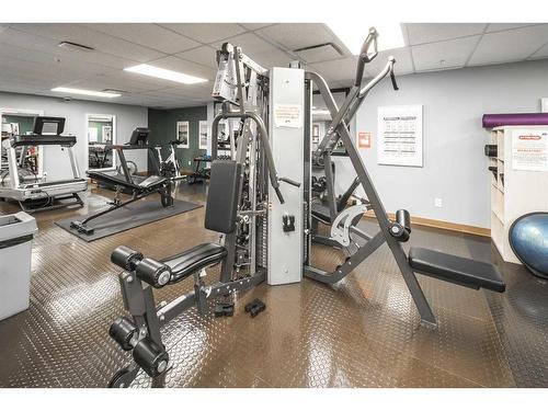 428-345 Rocky Vista Park Nw, Calgary, AB - Indoor Photo Showing Gym Room