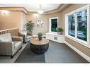 428-345 Rocky Vista Park Nw, Calgary, AB  - Indoor Photo Showing Living Room 