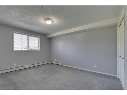 4224-10 Prestwick Bay Se, Calgary, AB - Indoor Photo Showing Other Room