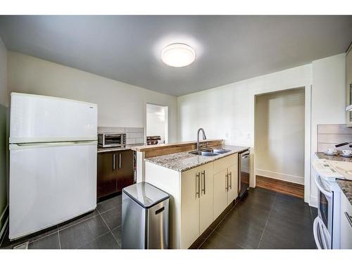 2232 Halifax Crescent Nw, Calgary, AB - Indoor Photo Showing Kitchen With Double Sink