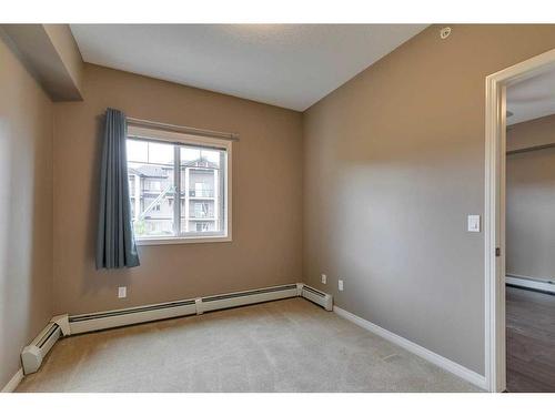 2405-175 Panatella Hill Nw, Calgary, AB - Indoor Photo Showing Other Room
