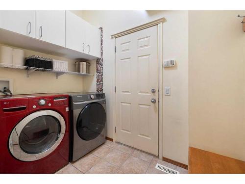 115 Chapala Drive Se, Calgary, AB - Indoor Photo Showing Laundry Room