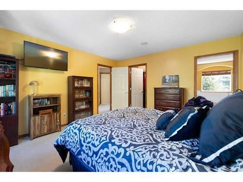 115 Chapala Drive Se, Calgary, AB - Indoor Photo Showing Bedroom