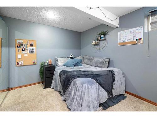 115 Chapala Drive Se, Calgary, AB - Indoor Photo Showing Bedroom