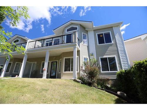 421 Rocky Vista Gardens Nw, Calgary, AB - Outdoor With Balcony With Facade