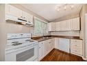 6425 & 6427 35 Avenue Nw, Calgary, AB  - Indoor Photo Showing Kitchen With Double Sink 