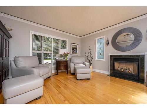 1809 18 Avenue Nw, Calgary, AB - Indoor Photo Showing Living Room With Fireplace
