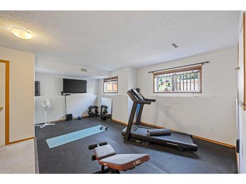 80 Douglas Ridge Circle Se, Calgary, AB - Indoor Photo Showing Gym Room