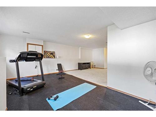 80 Douglas Ridge Circle Se, Calgary, AB - Indoor Photo Showing Gym Room