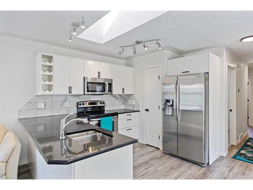 80 Douglas Ridge Circle Se, Calgary, AB - Indoor Photo Showing Kitchen With Stainless Steel Kitchen With Upgraded Kitchen
