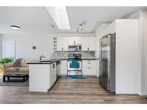 80 Douglas Ridge Circle Se, Calgary, AB - Indoor Photo Showing Kitchen With Stainless Steel Kitchen