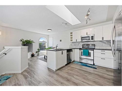 80 Douglas Ridge Circle Se, Calgary, AB - Indoor Photo Showing Kitchen With Stainless Steel Kitchen