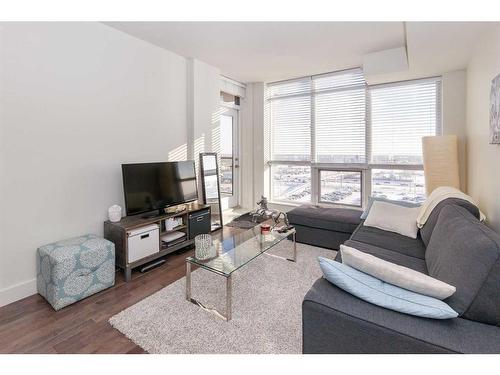 403-10 Shawnee Hill Sw, Calgary, AB - Indoor Photo Showing Living Room