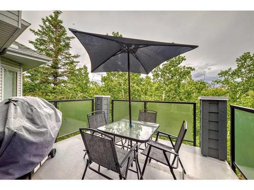 411-20 Sierra Morena Mews Sw, Calgary, AB - Outdoor With Deck Patio Veranda With Exterior