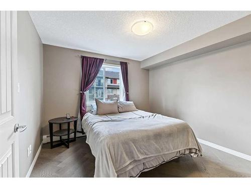 2313-175 Panatella Hill Nw, Calgary, AB - Indoor Photo Showing Bedroom