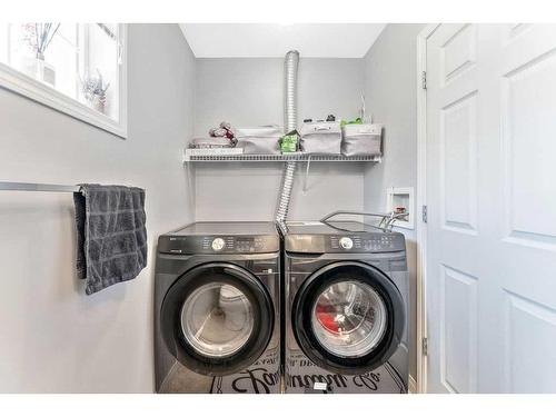 114 Hidden Creek Cove Nw, Calgary, AB - Indoor Photo Showing Laundry Room