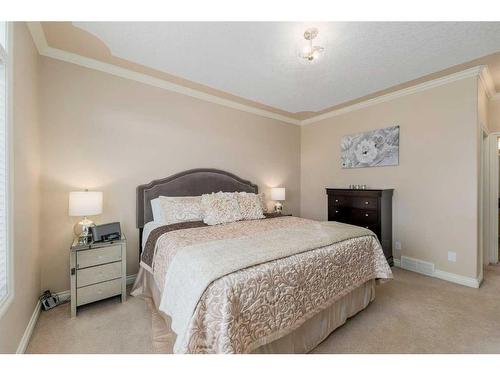 22 Discovery Woods Villas Sw, Calgary, AB - Indoor Photo Showing Bedroom