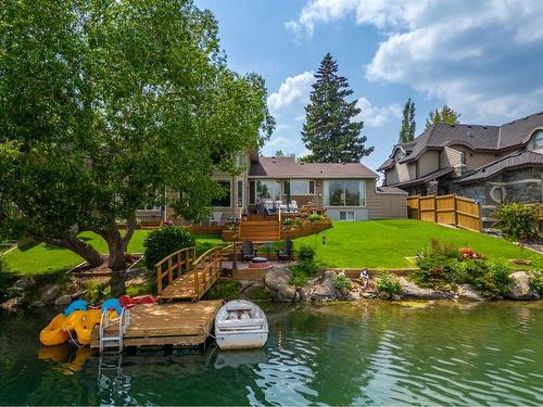 532 Lake Moraine Green Se, Calgary, AB - Outdoor With Body Of Water With Deck Patio Veranda With Backyard