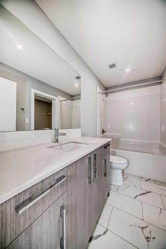 2107-681 Savanna Boulevard Ne, Calgary, AB - Indoor Photo Showing Bathroom