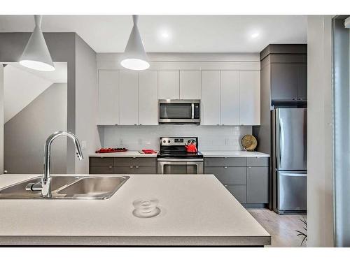 3545 69 Street Nw, Calgary, AB - Indoor Photo Showing Kitchen With Stainless Steel Kitchen With Double Sink