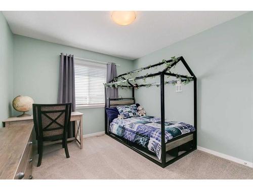 36 Drake Landing Gardens, Okotoks, AB - Indoor Photo Showing Bedroom