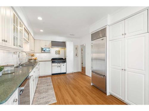 1201 Premier Way Sw, Calgary, AB - Indoor Photo Showing Kitchen With Double Sink