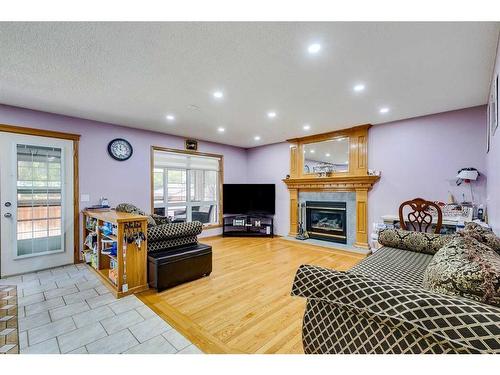 281 Westchester Green, Chestermere, AB - Indoor With Fireplace