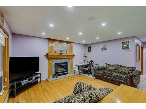 281 Westchester Green, Chestermere, AB - Indoor With Fireplace