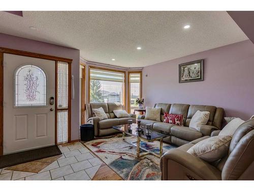 281 Westchester Green, Chestermere, AB - Indoor Photo Showing Living Room