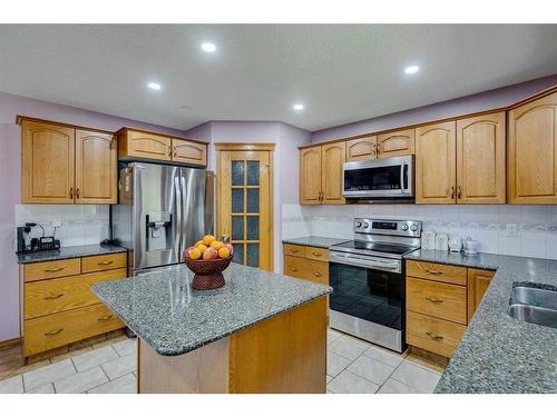 281 Westchester Green, Chestermere, AB - Indoor Photo Showing Kitchen With Double Sink