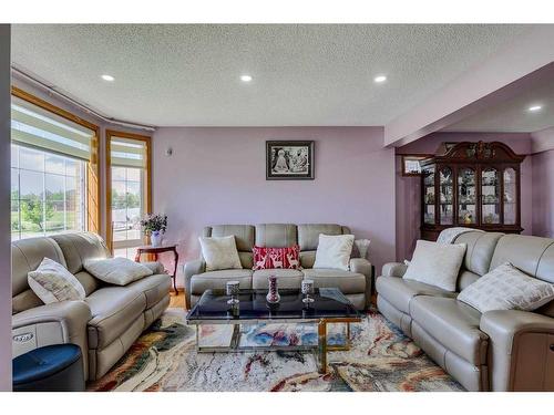 281 Westchester Green, Chestermere, AB - Indoor Photo Showing Living Room