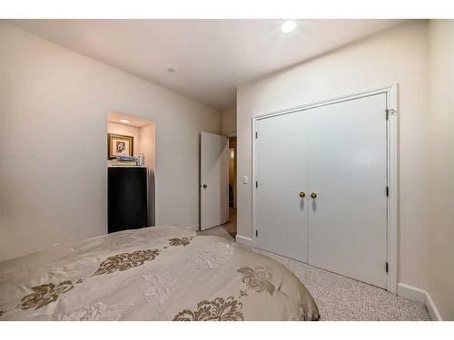 1122 Talon Avenue Sw, Calgary, AB - Indoor Photo Showing Bedroom