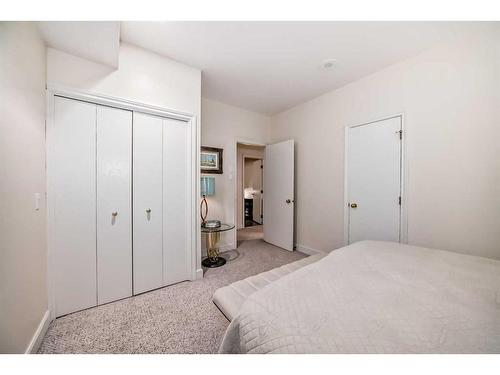 1122 Talon Avenue Sw, Calgary, AB - Indoor Photo Showing Bedroom